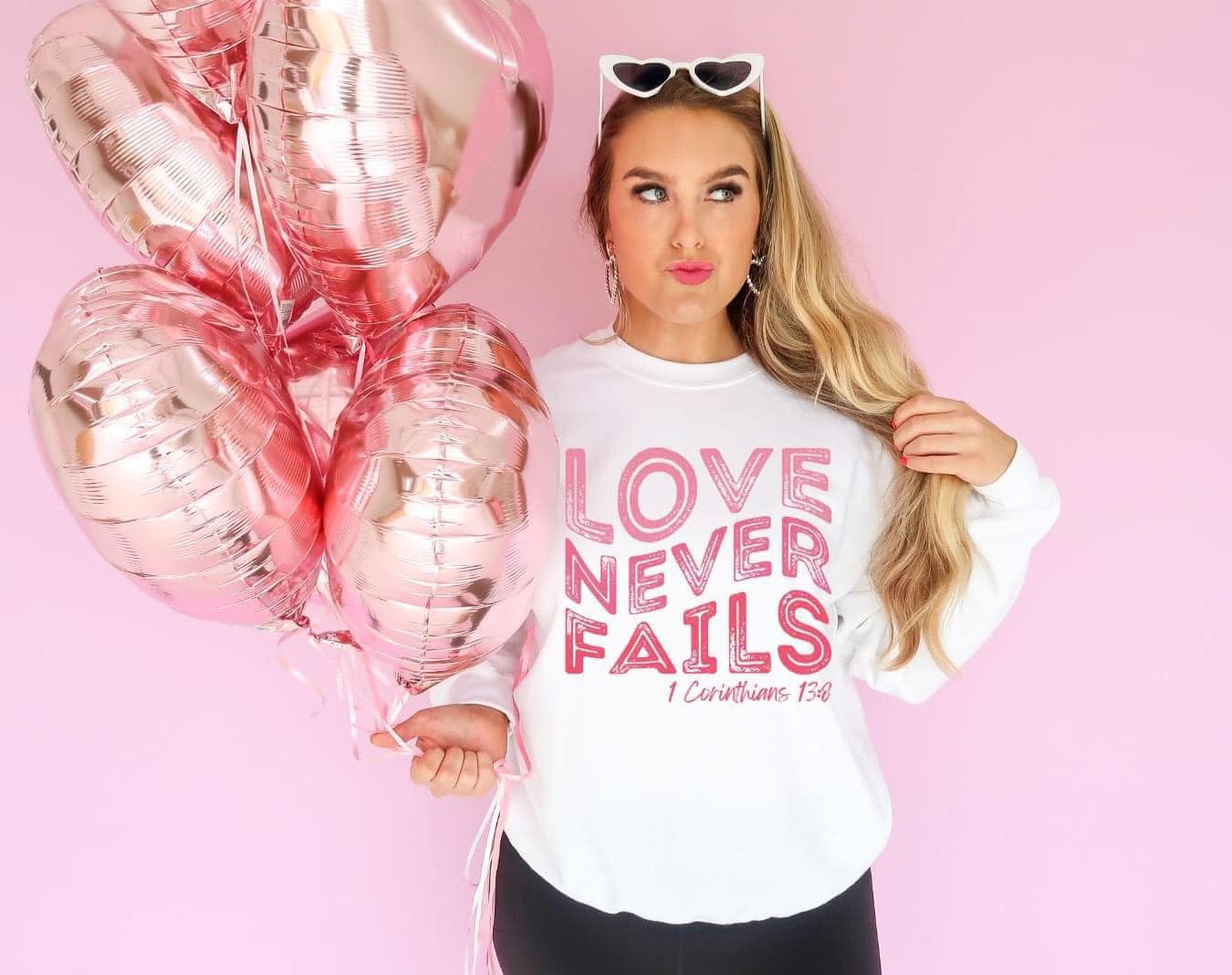 Love Never Fails Sweatshirt